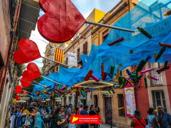 Улица Хоан Бланкес де Байш (Carrer de Joan Blanques de Baix): «Сант Медиар в августе» — дань уважения другой крупной фиесте Грасии. (‘Sant Medir a l’agost’. Un homenatge a l’altra festa gran de Gràcia.) - Феста Майор де Грасиа 2024 (Festa Major de Gràcia 2024)