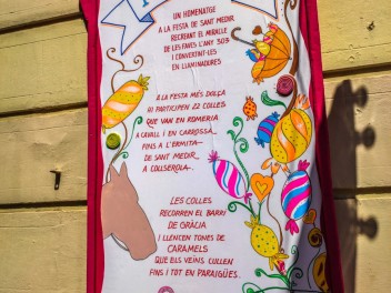 Улица Хоан Бланкес де Байш (Carrer de Joan Blanques de Baix): «Сант Медиар в августе» — дань уважения другой крупной фиесте Грасии. (‘Sant Medir a l’agost’. Un homenatge a l’altra festa gran de Gràcia.) - Феста Майор де Грасиа 2024 (Festa Major de Gràcia 2024)