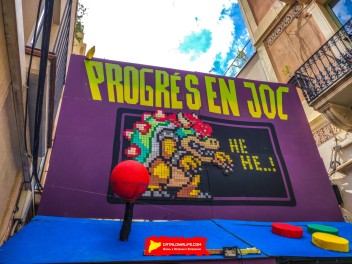 Улица Прогрес (Carrer del Progrés): «Прогресс в игре» — дань уважения видеоиграм 80-х годов и современным. (‘Progrés en joc’. Un homenatge als videojocs dels anys 80 i als actuals.) - Феста Майор де Грасиа 2024 (Festa Major de Gràcia 2024)